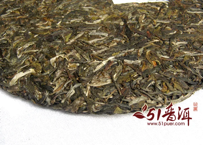 老曼峨 玉泉春 普洱茶 生饼 2009年/357克/饼 班章茶厂 陈年老茶 图4