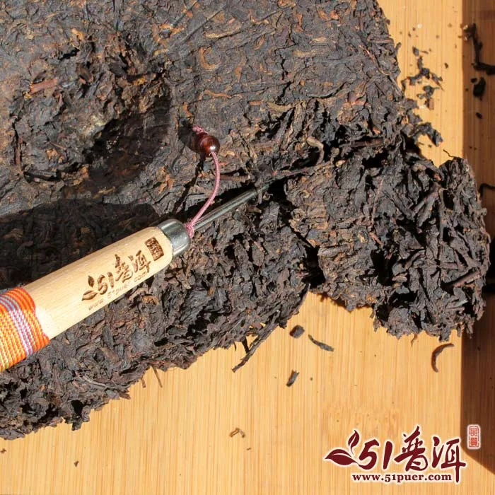 老曼峨 班章王 普洱茶 熟饼 2005年/357克/饼 勐海班章茶厂 陈年老茶 图15