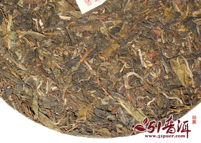 七彩云南 七彩印象 普洱茶 生饼 年份随机/357克/饼 正品庆丰祥 图5
