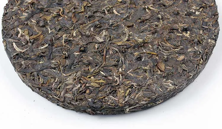 下关 丙申·康藏铁饼 普洱茶 生茶 2016年/357克/饼 茶厂建厂75周年纪念茶饼 图8