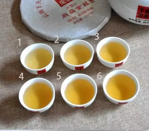 下关 尚品金丝铁饼 普洱茶 生茶 2017年/357克/饼 图5