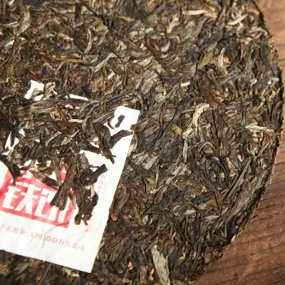 下关 泰安铁饼 普洱茶 生茶 2018年/357克 邦东大树茶 图4