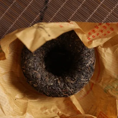 下关 特制甲级沱茶 普洱茶 生茶 2014年/100克/沱 圆盒装 图3