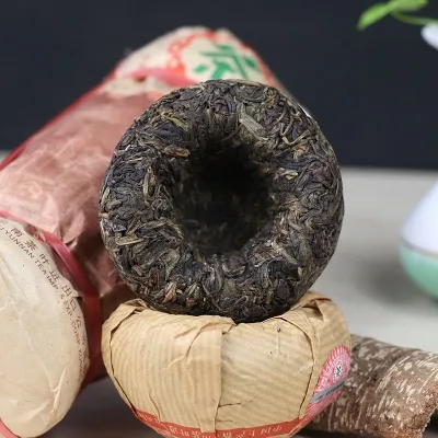 中茶  纪念香港回归十周年  普洱茶  生茶  2007年/100克/沱  陈年老茶 图4