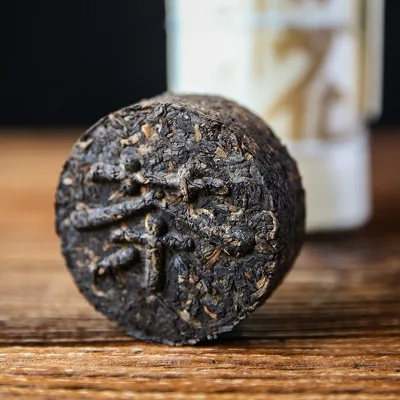 下关 梅花铁饼 普洱茶  熟茶    2021年/100克/饼 图2
