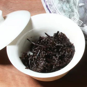 兴叶 2006年南糯山 南糯金毫 普洱茶熟茶 357克/饼 图4