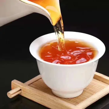 2005年老同志 7568 熟茶 357克/饼 陈年老茶 图3